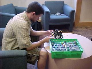 Graduate student building a robot