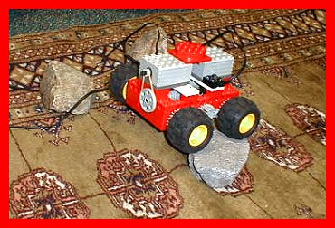 Close Up Of Rover Driving Over Rocks
