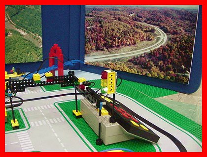 Towering Bridge In Background And LEGO Control Panel In Front