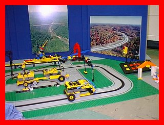 Passenger Station Located To The Right, LEGO Tractor Trailer In Center-Left