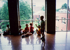 Taking a break at a window overlooking Marshall University campus.