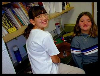 Sarah & Kassie working at the sink