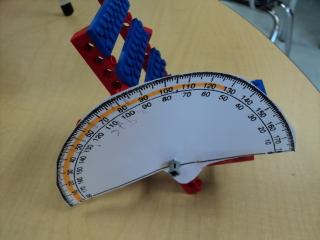 Taping the protractor on helps keep it still.